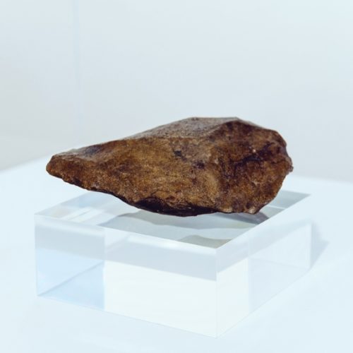 Palaeolithic Hand-Axe c. 250,000 – 200,000 BC. Loaned from the collections of Plymouth City Museum & Art Gallery (Plymouth City Council). Photo: Dom Moore. 